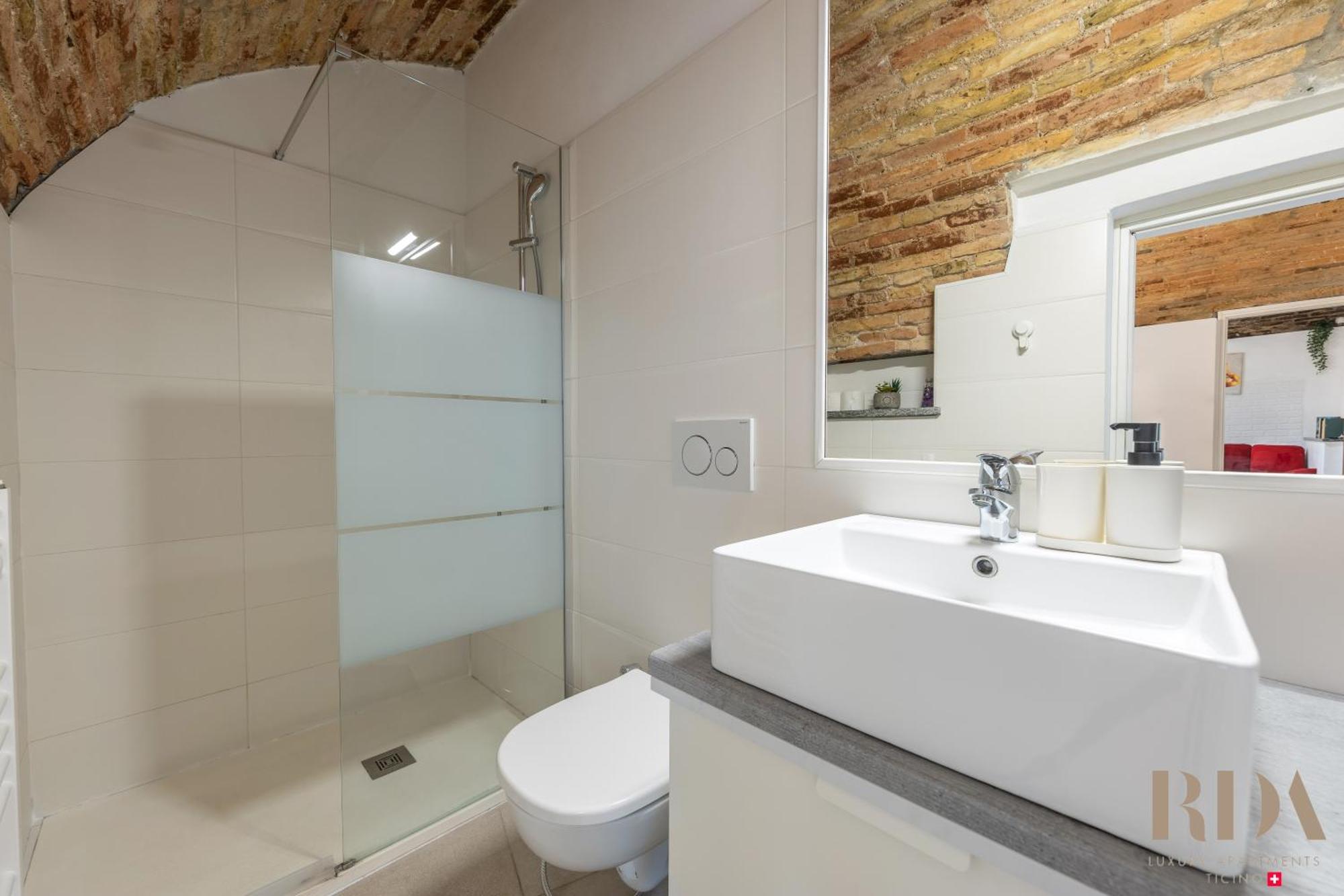 Il Rustico Rda Luxury Apartments Lago Parking 멘드리지오 외부 사진